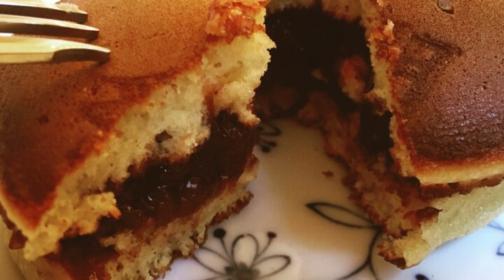 Eating mini dorayaki in the business district